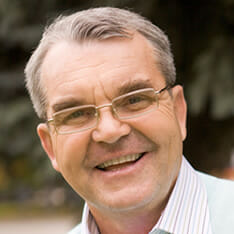 8494129-portrait-of-senior-male-in-eyeglasses-smiling-at-camera-updated